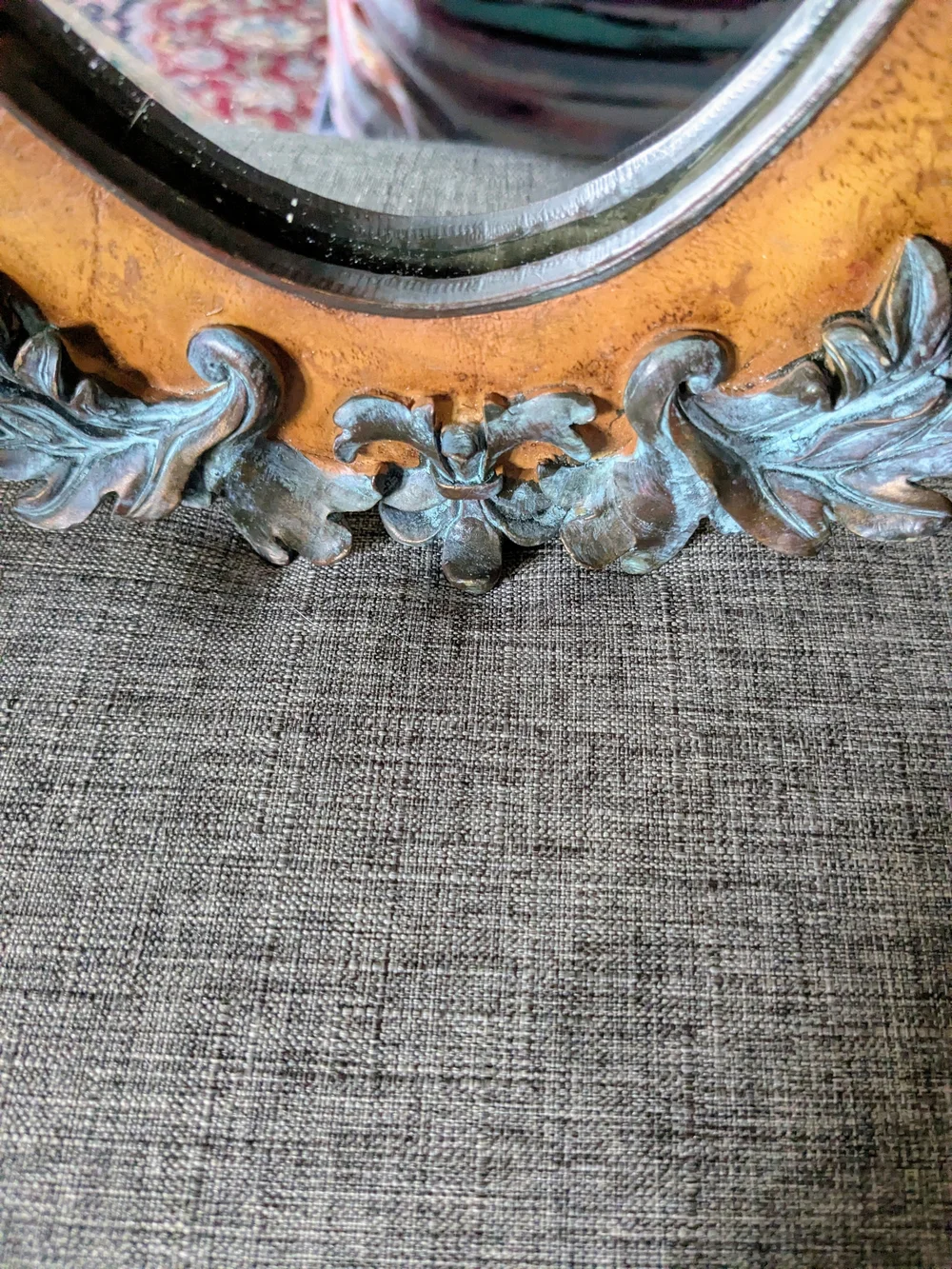 Ornate Brown And Aged Teal Oval Wall Mirror with Pineapple Finial